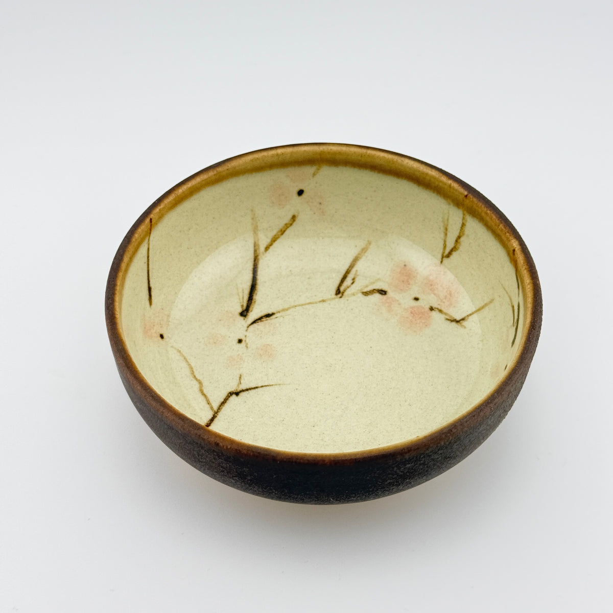 Bol en grès porcelainique à décor de cerisier et bord net, vue de dessus