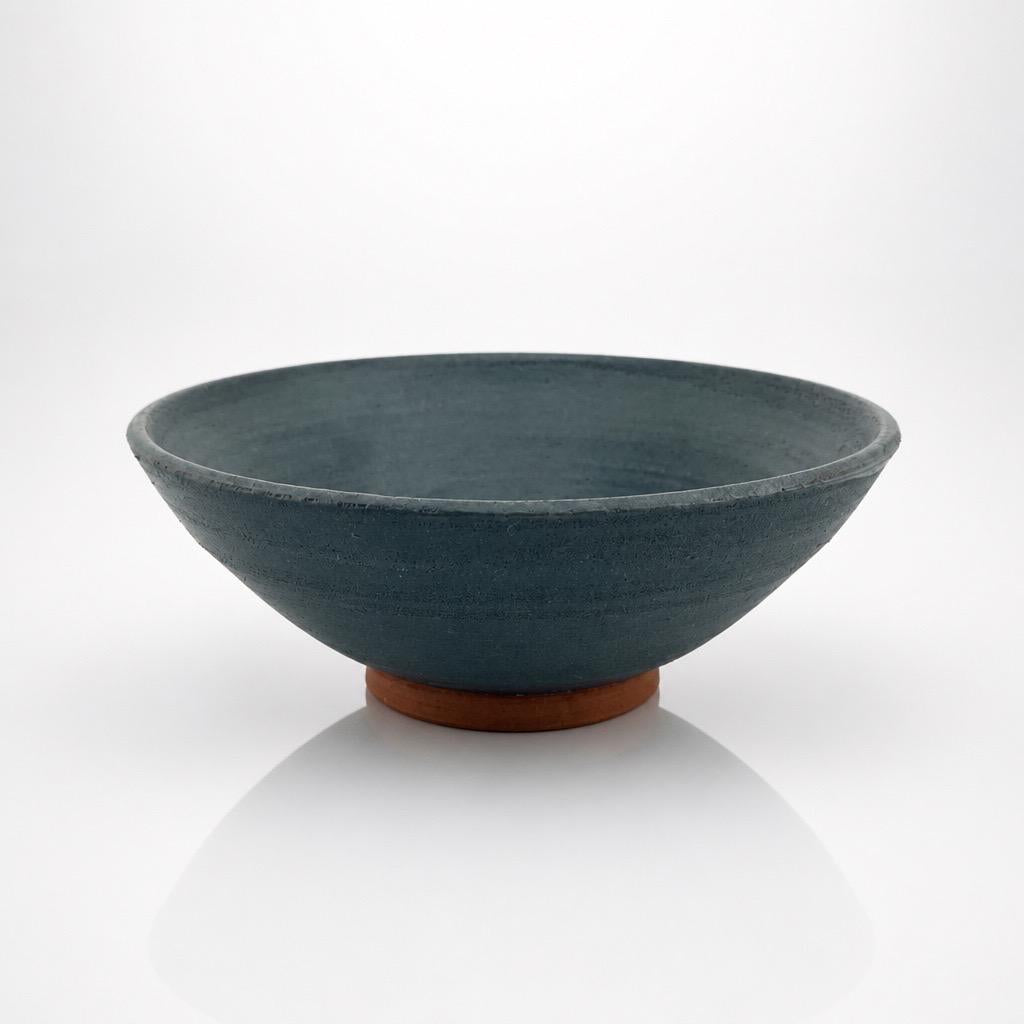 Bol artisanal bleu-gris en terre chinoise de Xing, pièce unique façonnée à la main par Terres.me.